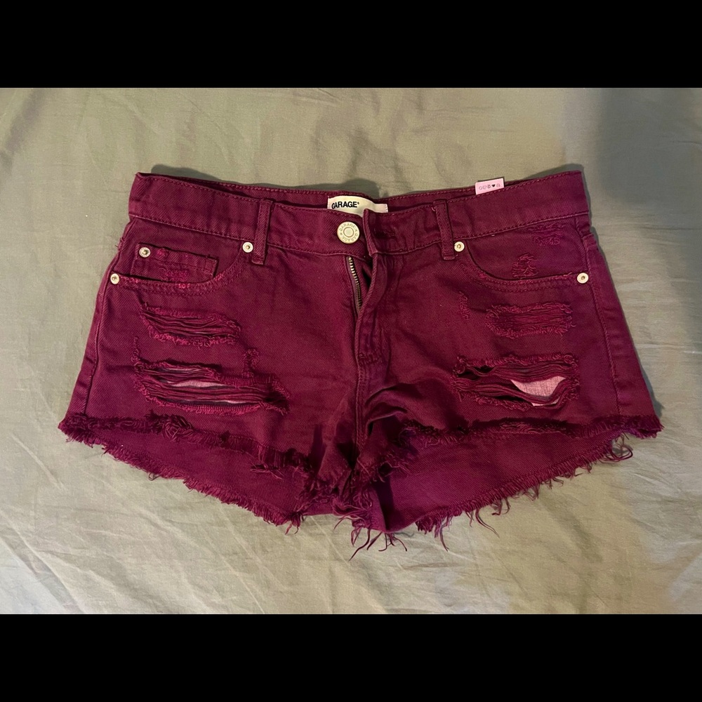 Maroon jean ripped short shorts, size 5 garage.